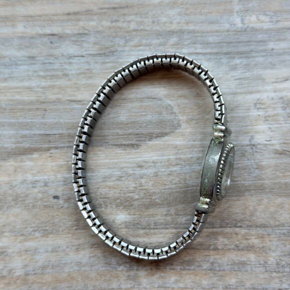 Vintage Dainty Silver Tone Watch Stretch Band Oval Face Minimal Classic 90s main image 4